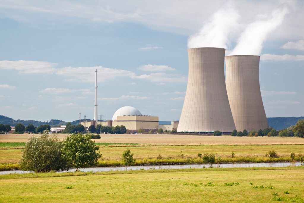 Nuclear Power Station In River Landscape