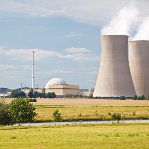 Nuclear Power Station In River Landscape